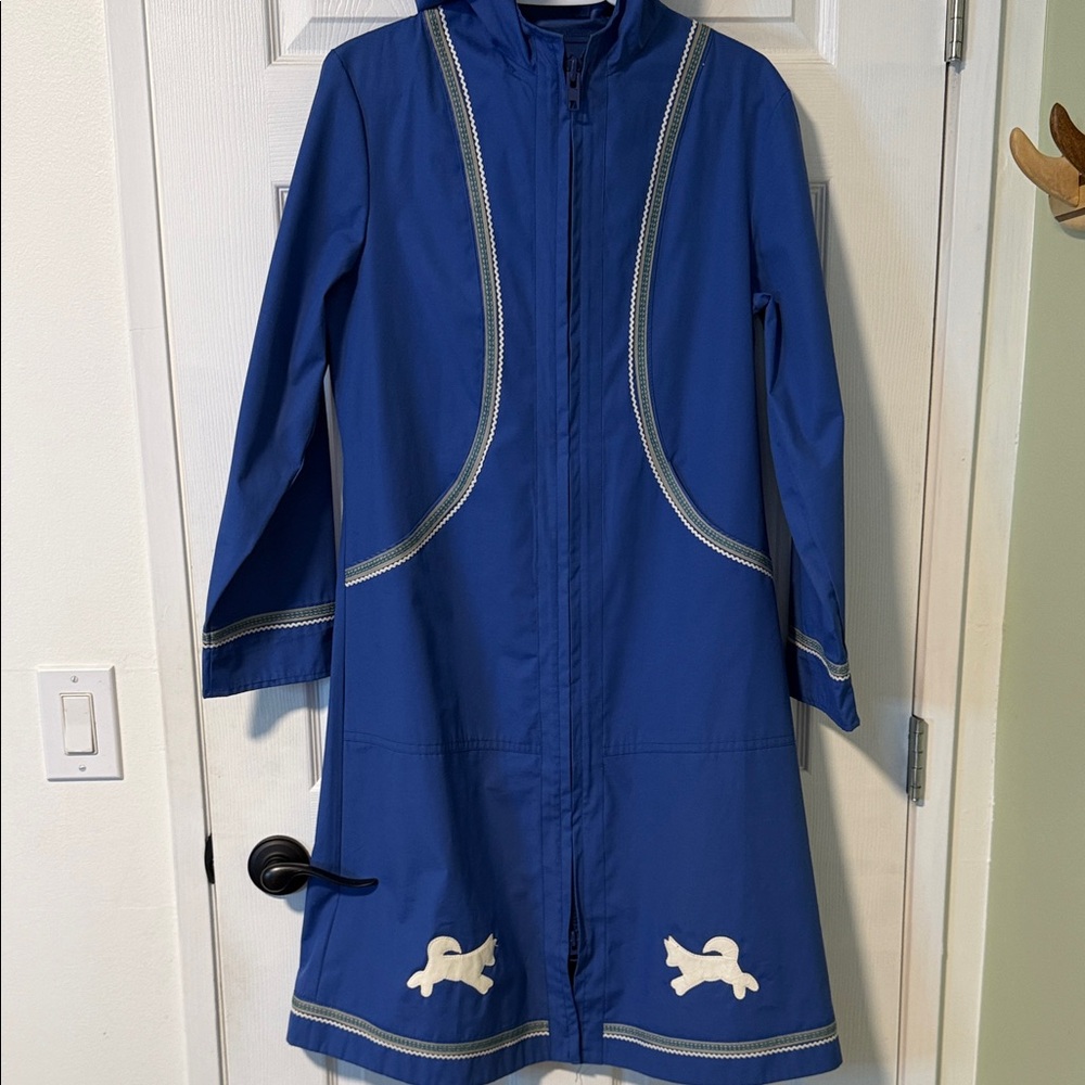 One of a kind incredible Blue rain coat with White Trim and Animal Design.